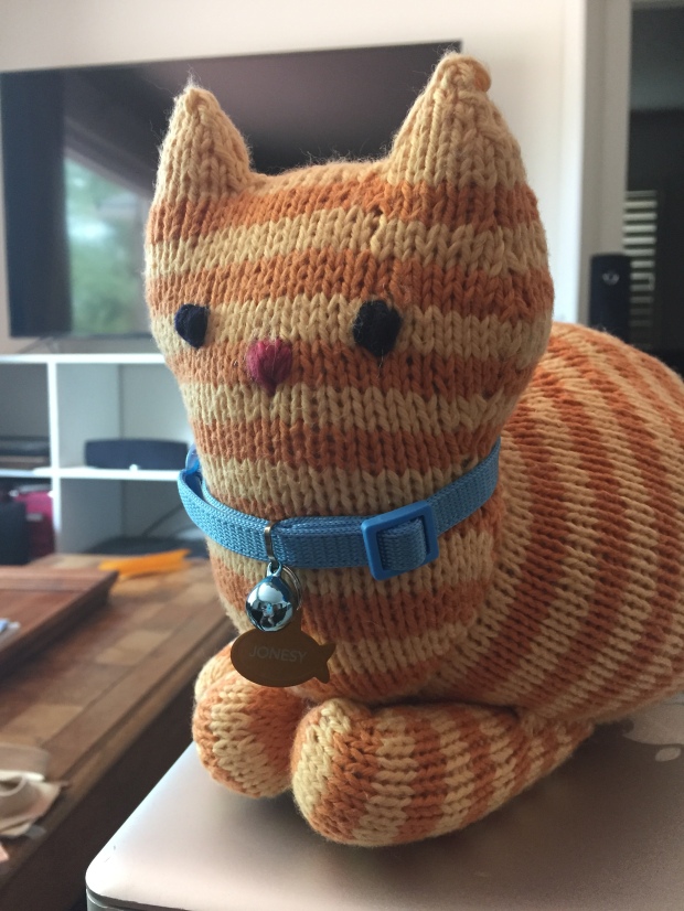 Knitted orange tabby Parlor Cat with Jonesy collar