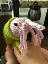 Knitted Nautie toy in lime and pink